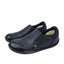 KURU Kivi women’s black leather slip‑ons